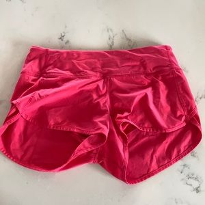 Hot pink lululemon running shorts